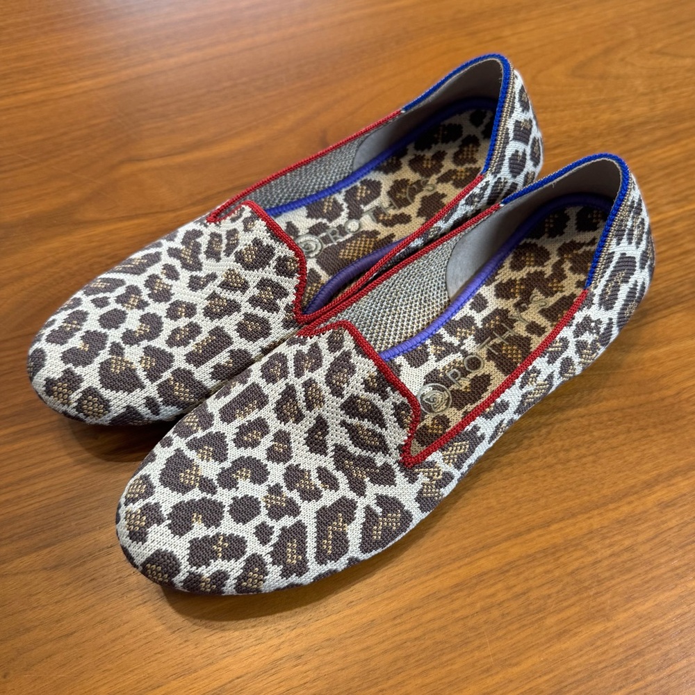 Rothy's Animal Print Loafers with Red and Blue Accents